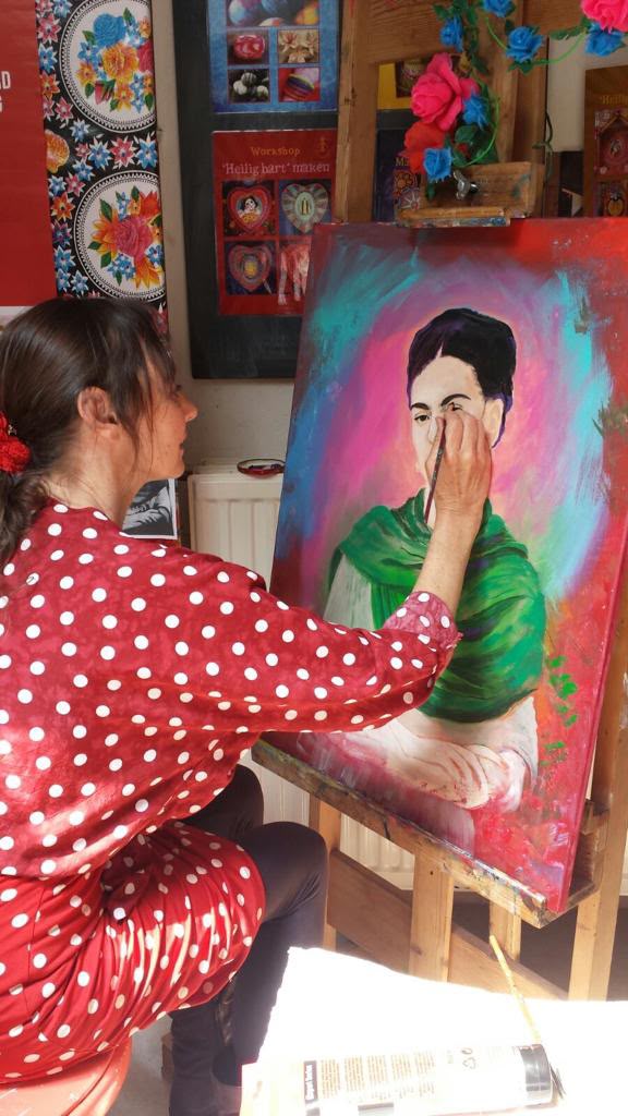 Poet painting in her studio